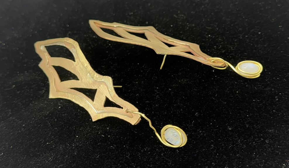 Prototype — front view, brass ear cuffs with moonstone drops